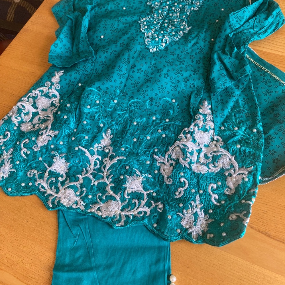 Sea green Embroidered shalwar kameez with white Accents